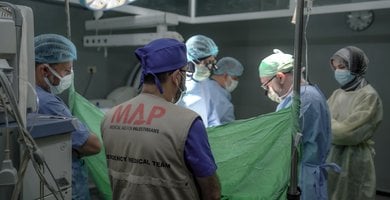 Dr Husam Bashir, an orthopedic surgeon from Kuwait, works on a MAP Emergency Medical Team.