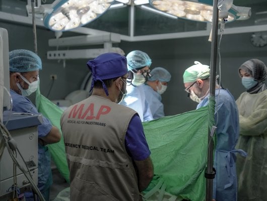 Dr Husam Bashir, an orthopedic surgeon from Kuwait, works on a MAP Emergency Medical Team.
