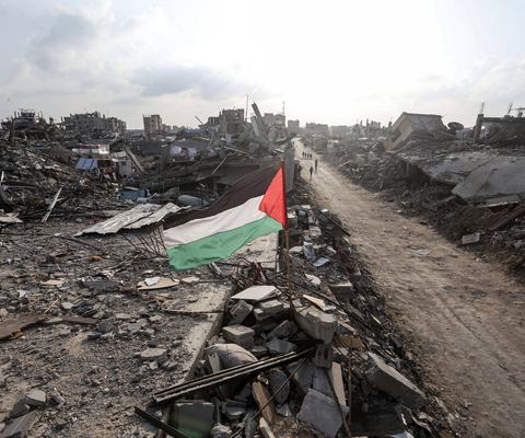 Palestinian flag planted in the rubble in Gaza.