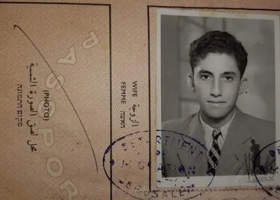 Dr Michael's portrait photo in his Palestinian passport.