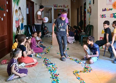 Children playing during one of MAP's facilitated mental health project activities in Lebanon