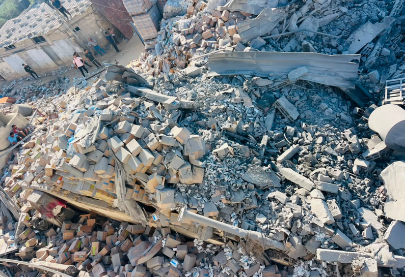 Warehouse belonging to Ard El Insan storing nutrition supplies intended for children, pregnant women and breastfeeding mothers in Gaza, destroyed by Israeli military strike.