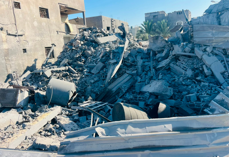 Warehouse belonging to Ard El Insan storing nutrition supplies intended for children, pregnant women and breastfeeding mothers in Gaza, destroyed by Israeli military strike.