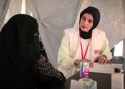 Mona Ramadan conducting an interview