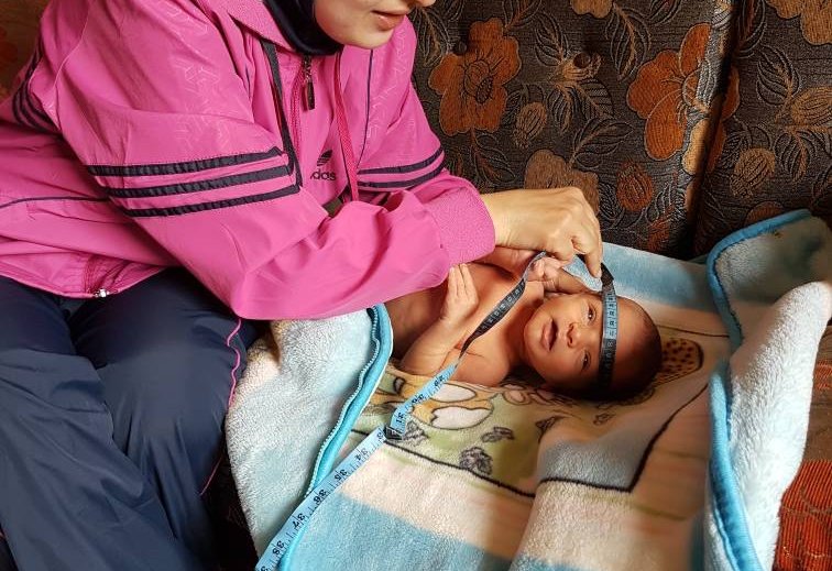 MAP midwife caring for a baby in Lebanon