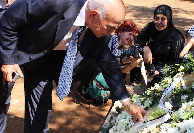 MAP's Director of Programmes in Lebanon, Dr Ali Dakwar, lays a wreath at a memorial service for the Sabra and Shatila massacre.