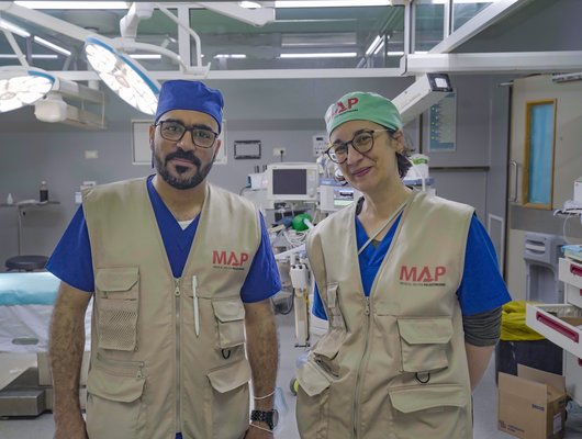 An image of Two Map Medical Professionals in a clean medical centre in Gaza